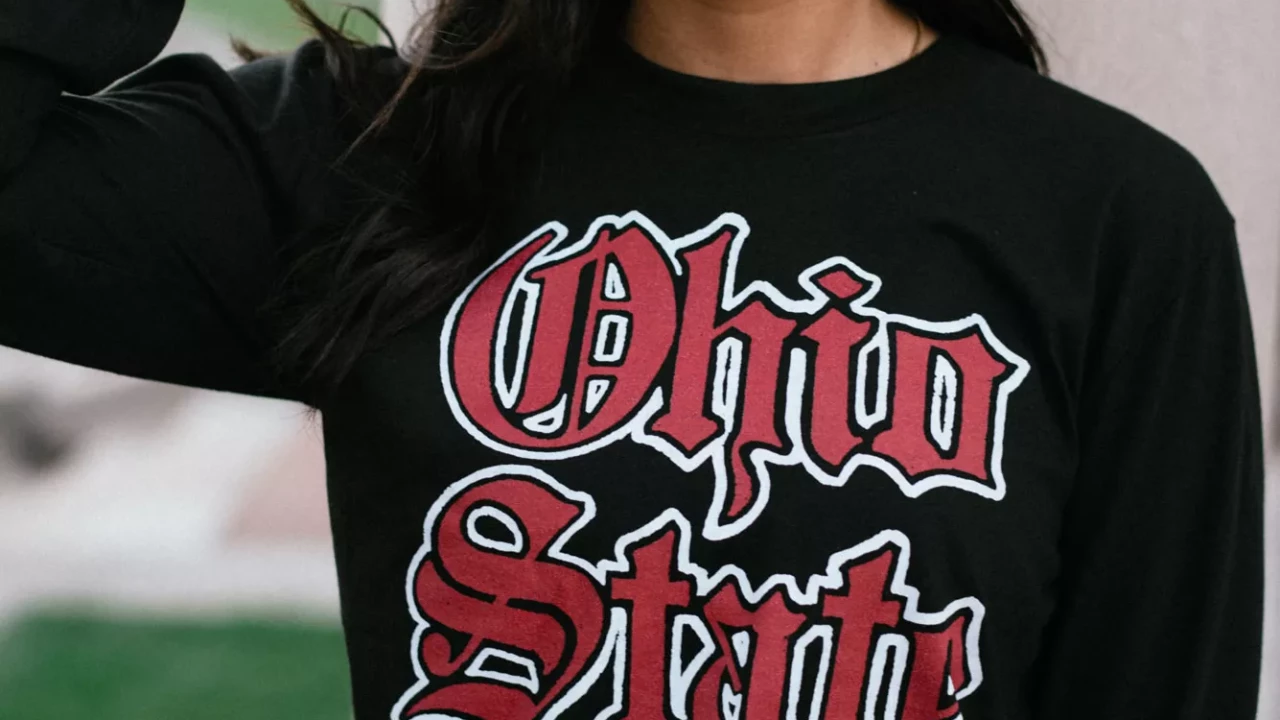 Model is wearing a black Crew Neck Sweatshirt with